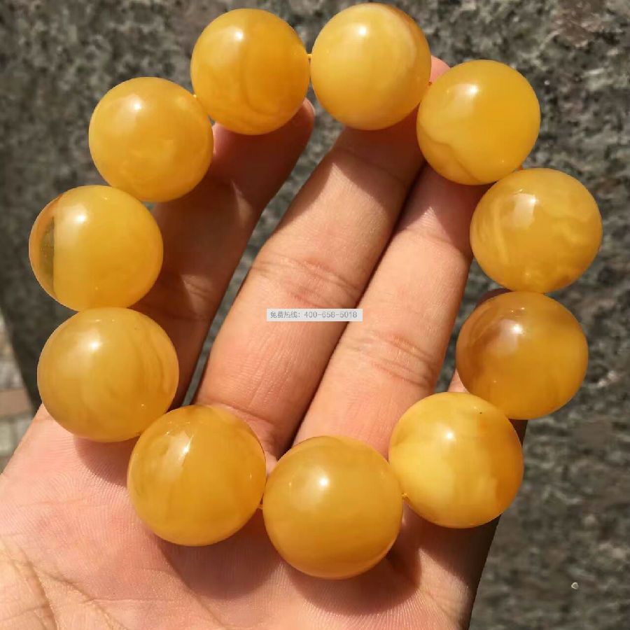 KX 标志俄料蜜蜡手串 KX 标志俄料蜜蜡手串
