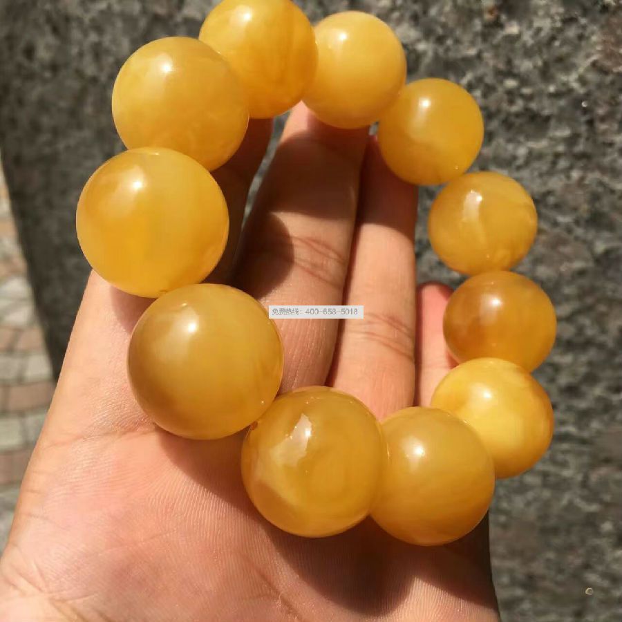 KX 标志俄料蜜蜡手串 KX 标志俄料蜜蜡手串