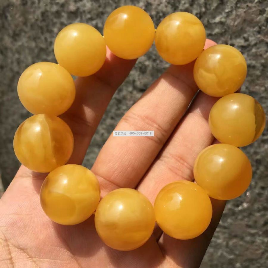 KX 标志俄料蜜蜡手串 KX 标志俄料蜜蜡手串