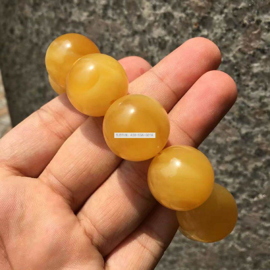KX 标志俄料蜜蜡手串 KX 标志俄料蜜蜡手串